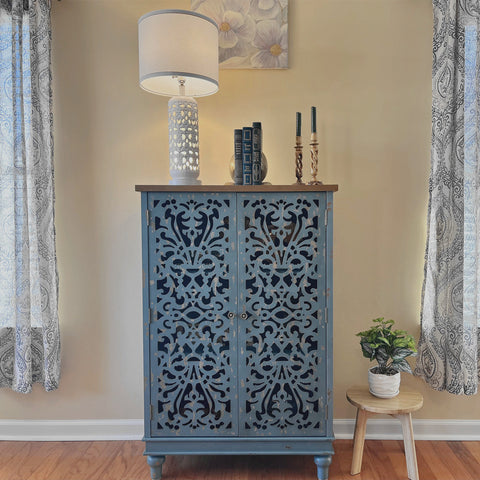 Tall Accent Storage Cabinet with Decorative Carved Design