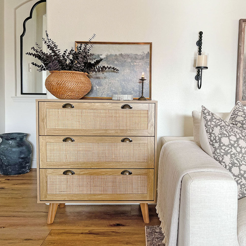 The rattan furniture collection, including a cabinet, dresser, TV stand and nightstands, seamlessly blends natural rattan elements with a modern Bohemian style, elevating your decor with its light and bright aesthetic.